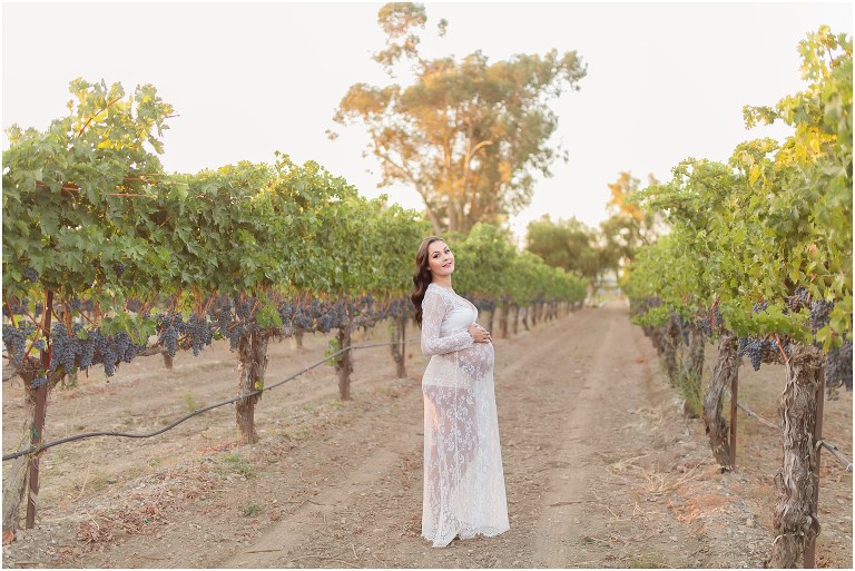 expecting mother posing for maternity photos