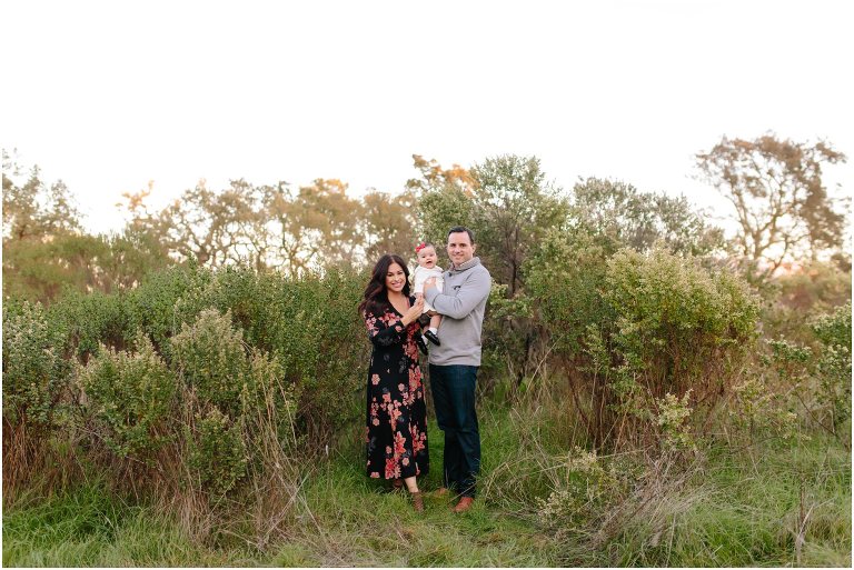 family portrait in big green field